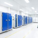 a row of blue and white lockers in a room