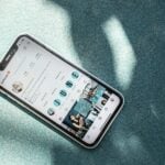 white samsung android smartphone on teal textile