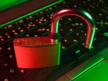 red padlock on black computer keyboard