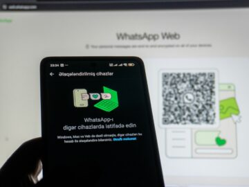 Phone scanning whatsapp web qr code on screen