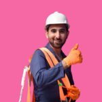 a person wearing a hard hat and safety vest
