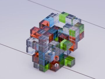 A colorful cube is shown on a white surface