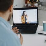 man and woman video business meeting
