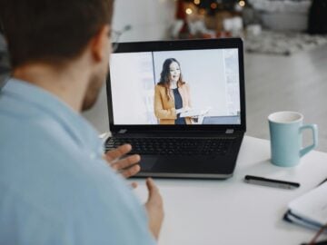 man and woman video business meeting