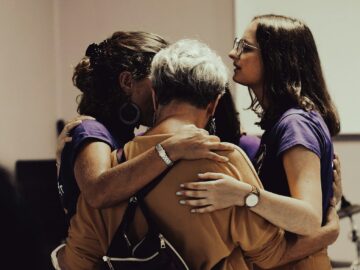 a man and woman kissing