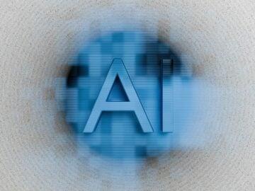 The letters ai are displayed on a blurred background