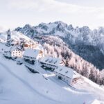 houses on mountain covered with snow